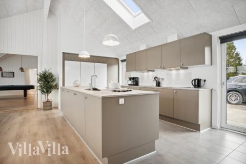 Köket i lyxstuga nr 814 är utrustat så att ni kan laga mat till 26 personer.