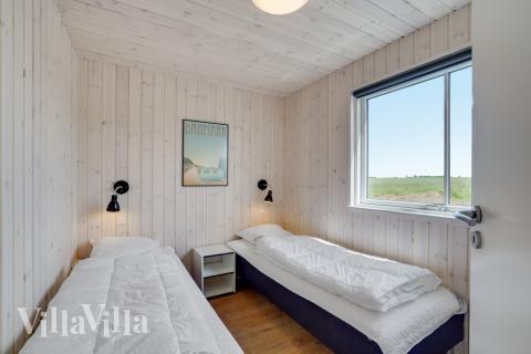 Ett av de 10 utmärkta sovrummen i lyxstuga nr 830 i Østjylland.