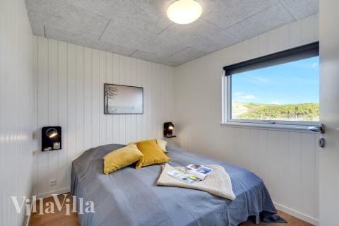 Ett av de 7 utmärkta sovrummen i lyxstuga nr 832 i Østjylland.