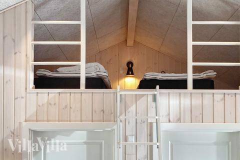 Några av de 14 sovplatserna finns på loftet i lyxstuga nr 649