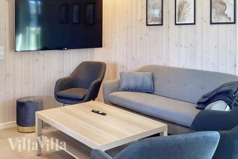 Aktivitetsrum i lyxstuga nr 649 med 5 sovrum och plats för 14 personer.