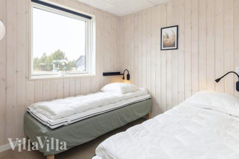 Ett av de 5 utmärkta sovrummen i lyxstuga nr 649 i Lolland/Falster/Møn.