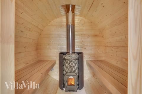 Njut av bastuvärmen i lyxstuga nr 674 för 26 personer