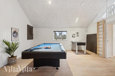 Tävla i sommarhusets aktivitetsrum när ni besöker lyxhus nr 647 i Fyn och öar.