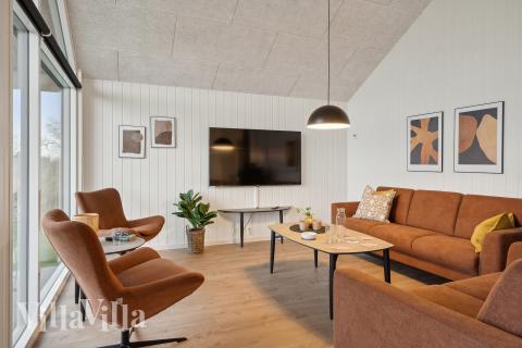 När ni besöker lyxhus nr 647 kan ni mysa tillsammans i sofforna.