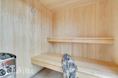 Njut av bastuvärmen i lyxstuga nr 652 för 20 personer