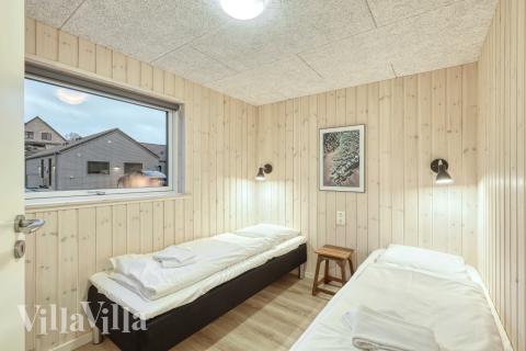 Ett av de 6 utmärkta sovrummen i lyxstuga nr 760 i Tyskland.