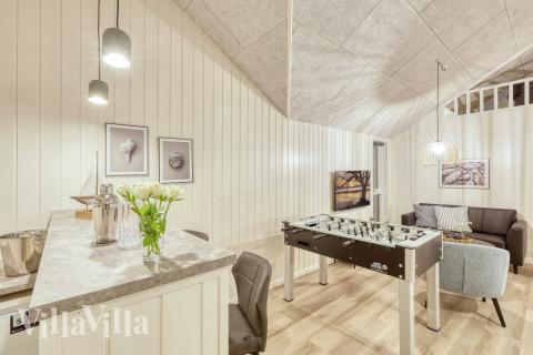 Tävla i sommarhusets aktivitetsrum när ni besöker lyxhus nr 761 i Tyskland.