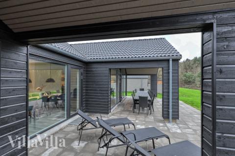 Njut av en grillkväll på terrassen i lyxstuga nr 763 i Tyskland