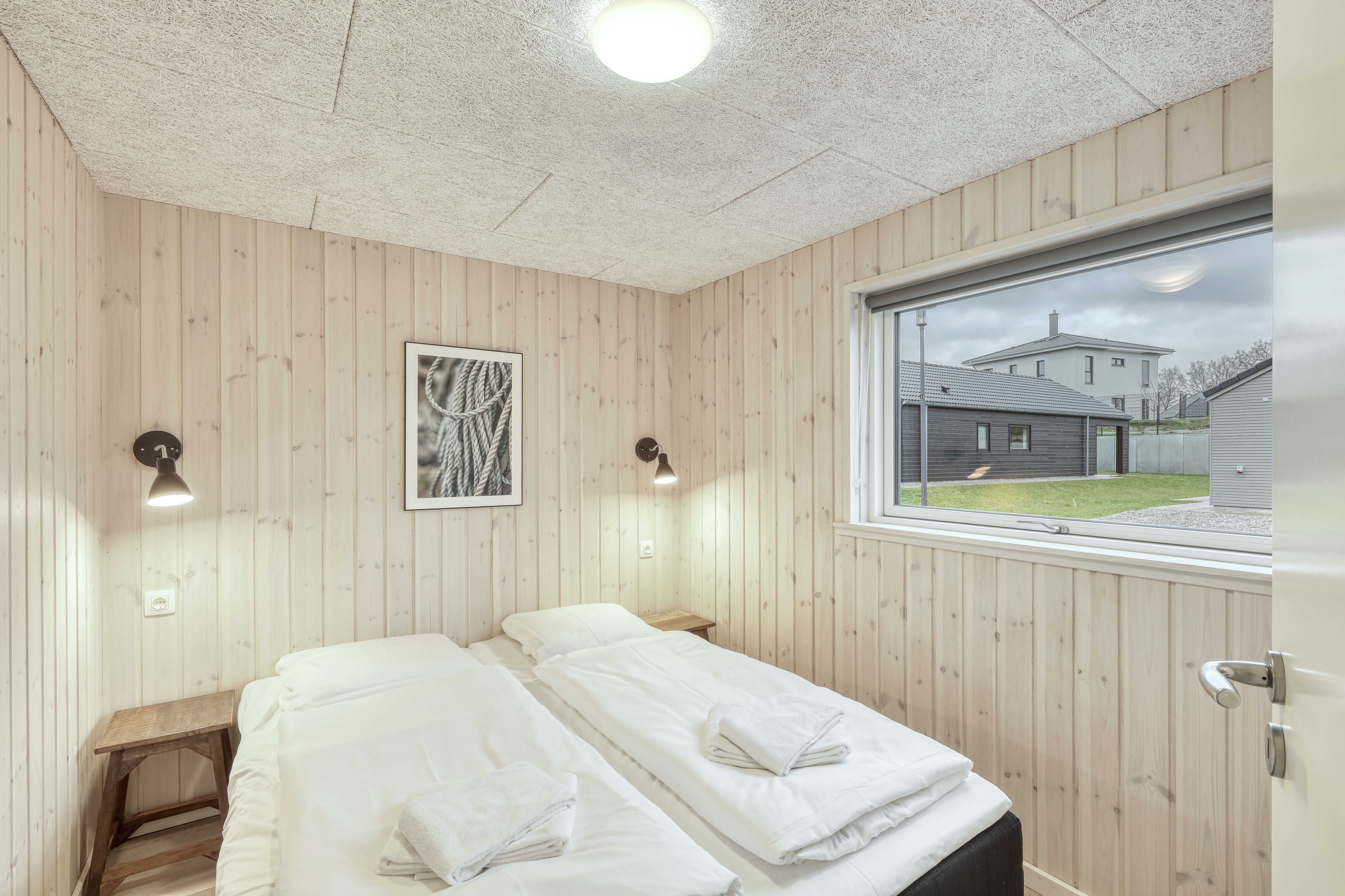 Ett av de 6 utmärkta sovrummen i lyxstuga nr 765 i Tyskland.