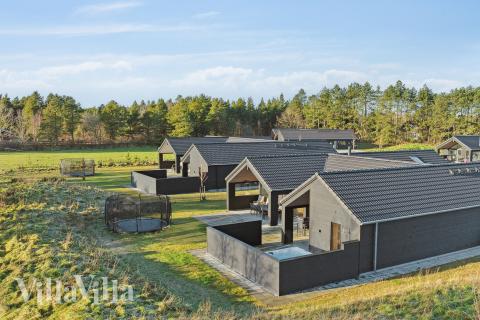 Den tjusiga sommarstugan nr 597 med gott om plats för upp till 18 personer