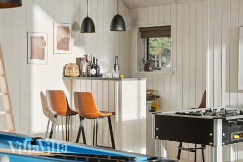 Tävla i sommarhusets aktivitetsrum när ni besöker lyxhus nr 653 i Vestjylland.