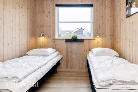 Ett av de 6 utmärkta sovrummen i lyxstuga nr 218 i Lolland/Falster/Møn.