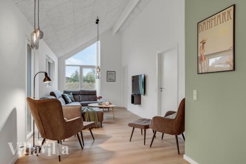 När ni besöker lyxhus nr 692 kan ni mysa tillsammans i sofforna.