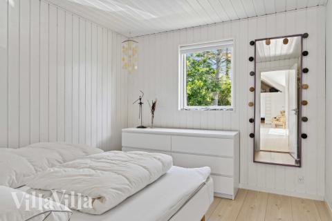 Ett av de 4 utmärkta sovrummen i lyxstuga nr 691 i Nordjylland.