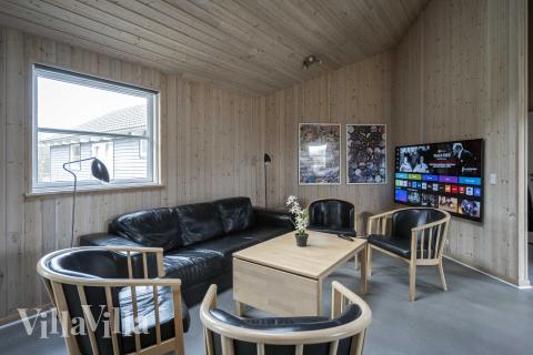 Tävla i sommarhusets aktivitetsrum när ni besöker lyxhus nr 275 i Nordsjälland.