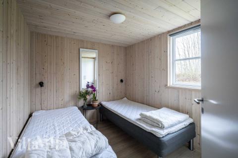 Ett av de 7 utmärkta sovrummen i lyxstuga nr 275 i Nordsjälland.