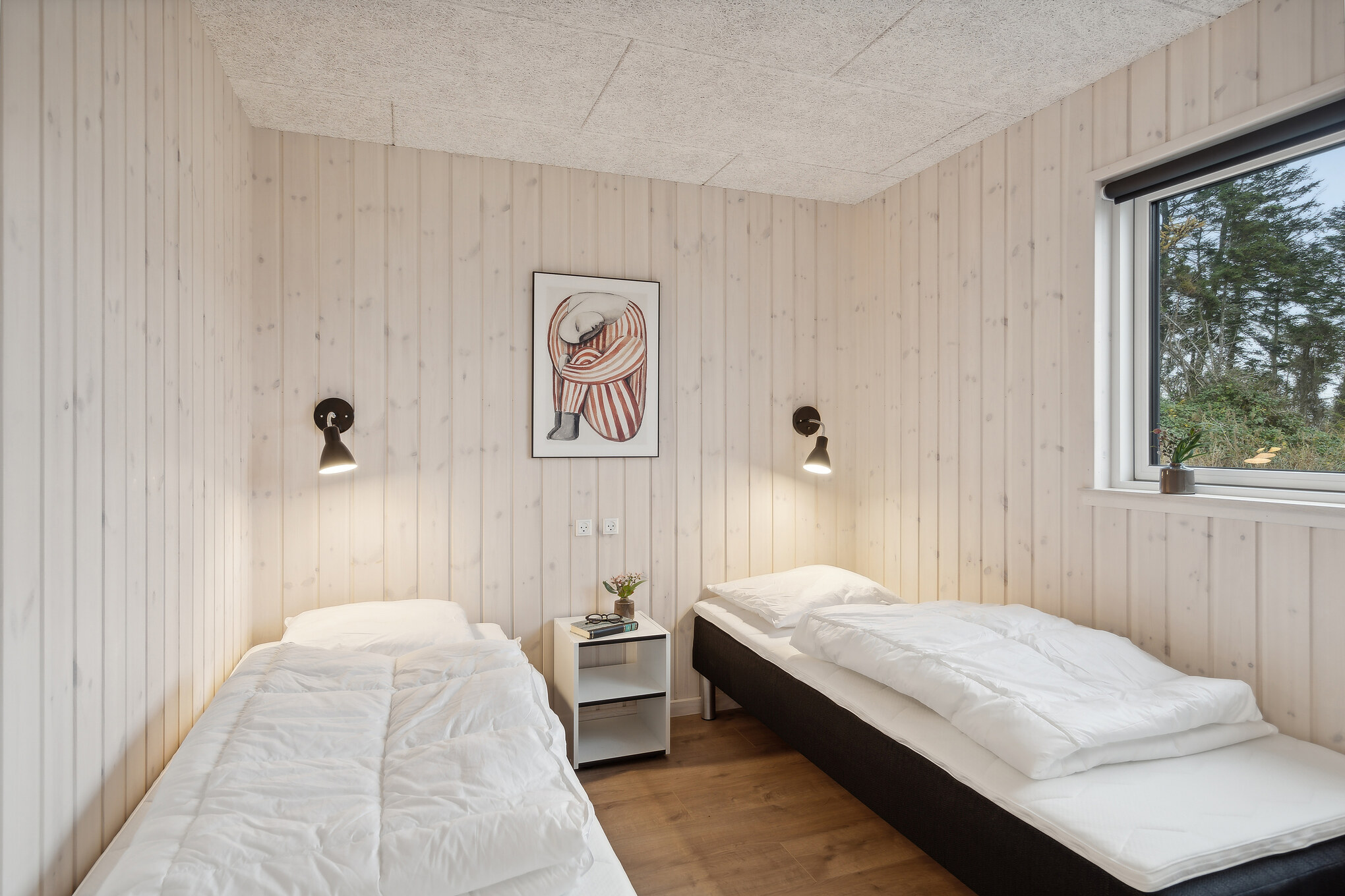 Ett av de 7 utmärkta sovrummen i lyxstuga nr 667 i Fyn och öar.