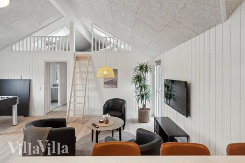Tävla i sommarhusets aktivitetsrum när ni besöker lyxhus nr 664 i Sydjylland.