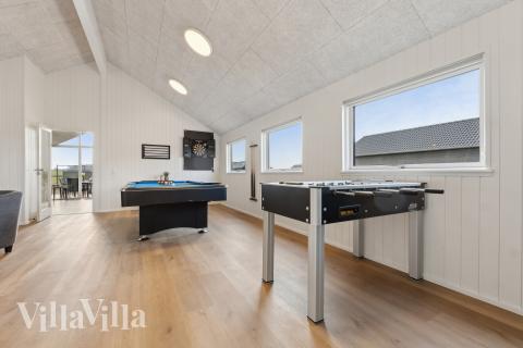 Tävla i sommarhusets aktivitetsrum när ni besöker lyxhus nr 665 i Fyn och öar.