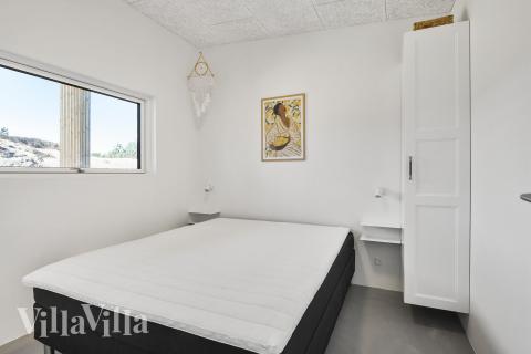 Ett av de 4 utmärkta sovrummen i lyxstuga nr 687 i Vestjylland.