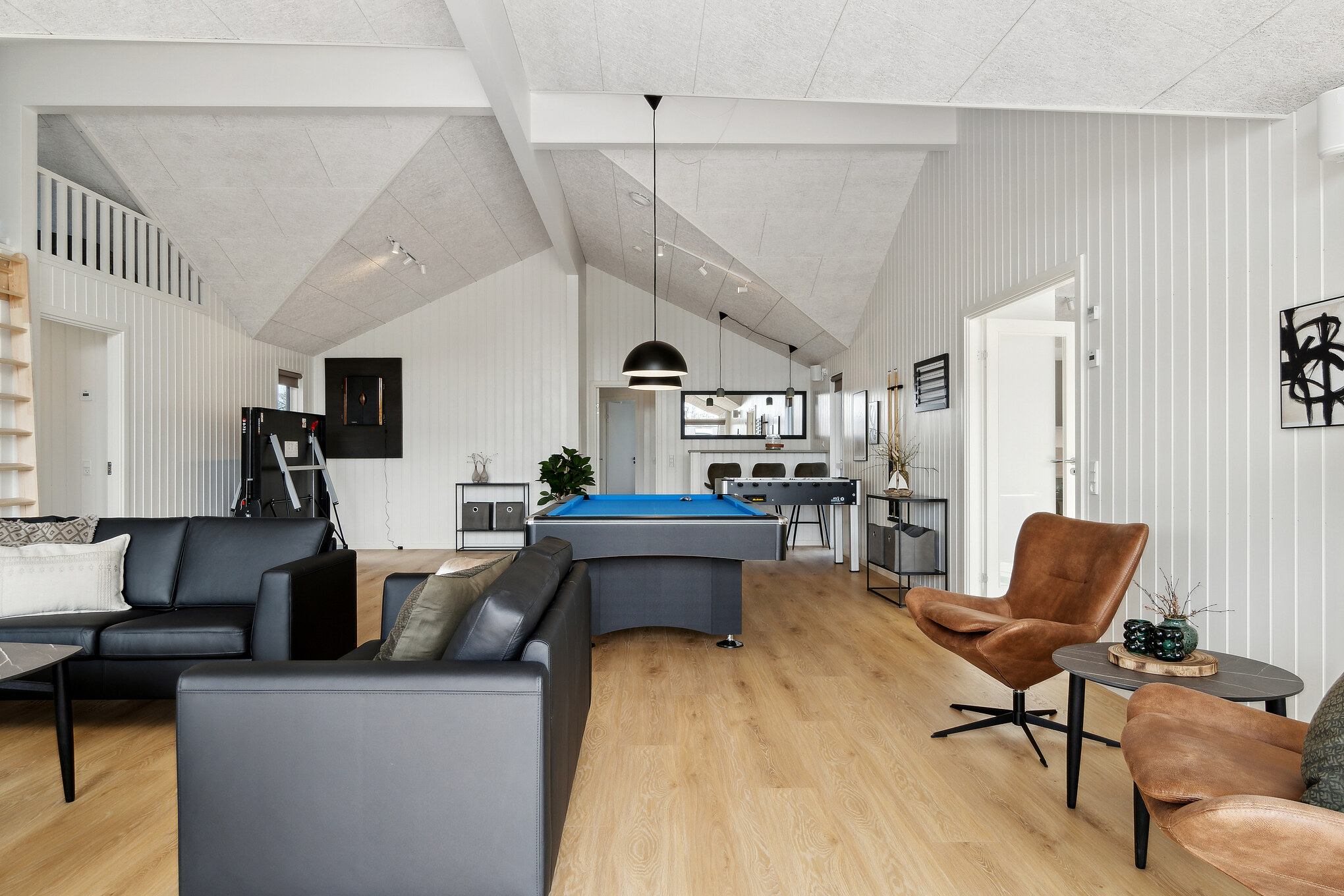 Tävla i sommarhusets aktivitetsrum när ni besöker lyxhus nr 910 i Lolland/Falster/Møn.