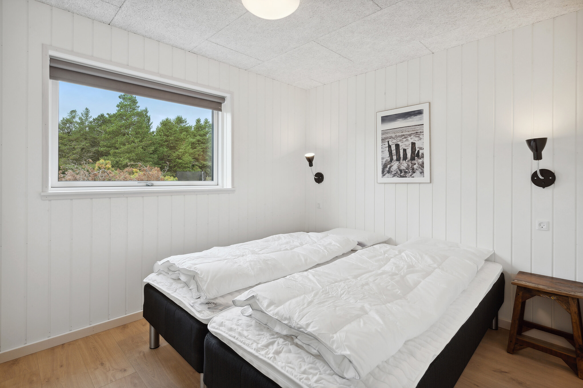 Ett av de 12 utmärkta sovrummen i lyxstuga nr 910 i Lolland/Falster/Møn.