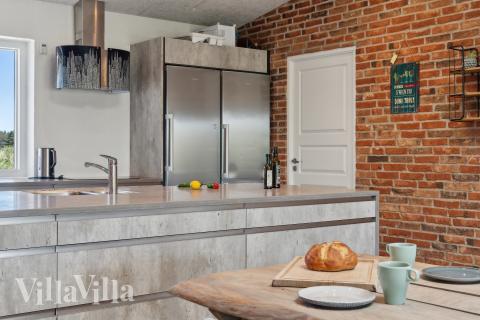 Köket i lyxstuga nr 607 är utrustat så att ni kan laga mat till 18 personer.