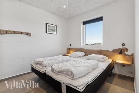 Ett av de 8 utmärkta sovrummen i lyxstuga nr 607 i Nordjylland.