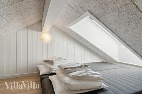 Några av de 16 sovplatserna finns på loftet i lyxstuga nr 803