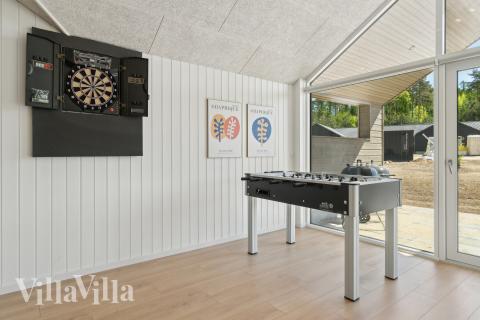 Aktivitetsrum i lyxstuga nr 809 med 9 sovrum och plats för 24 personer.