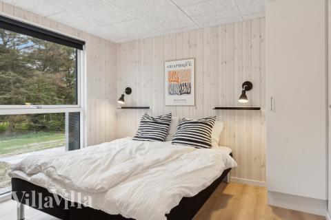 Ett av de 8 utmärkta sovrummen i lyxstuga nr 659 i Nordjylland.
