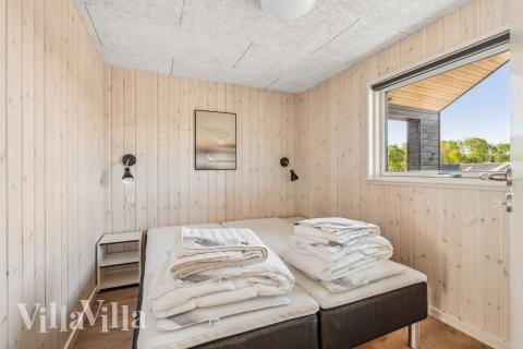 Ett av de 8 utmärkta sovrummen i lyxstuga nr 657 i Sydjylland.