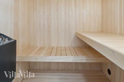 Njut av bastuvärmen i lyxstuga nr 689 för 10 personer