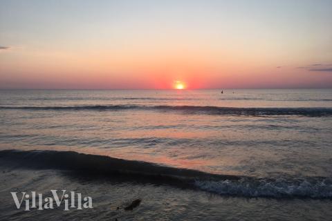 Stranden i närheten av lyxhus 909.