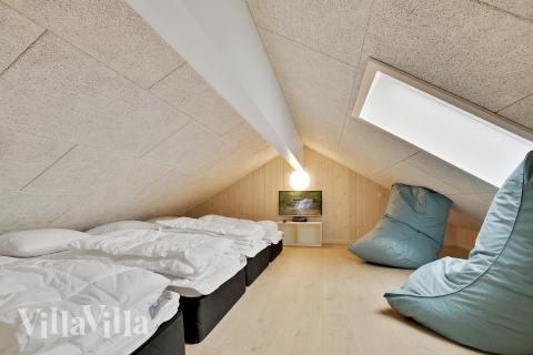 Några av de 16 sovplatserna finns på loftet i lyxstuga nr 388