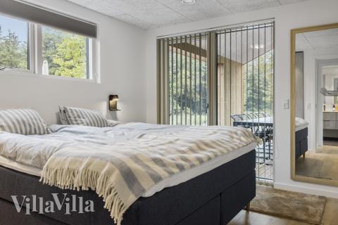 Ett av de 4 utmärkta sovrummen i lyxstuga nr 683 i Nordjylland.