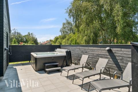 Njut av spabadets värme i lyxstuga nr 685 i Nordsjälland