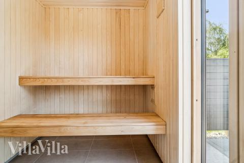 Njut av bastuvärmen i lyxstuga nr 685 för 14 personer