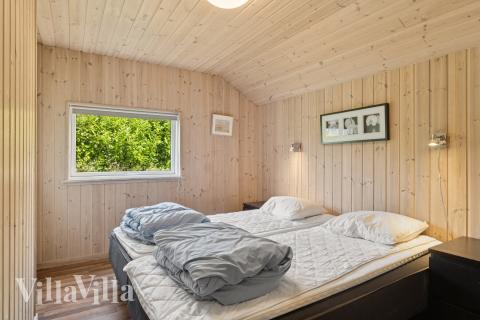 Ett av de 5 utmärkta sovrummen i lyxstuga nr 268 i Østjylland.