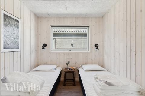 Ett av de 7 utmärkta sovrummen i lyxstuga nr 667 i Fyn och öar.