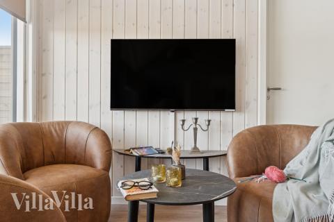 Aktivitetsrum i lyxstuga nr 671 med 8 sovrum och plats för 20 personer.