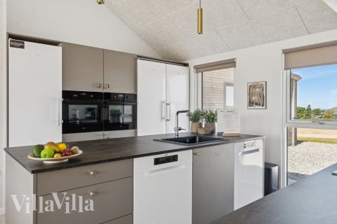 Köket i lyxstuga nr 671 är utrustat så att ni kan laga mat till 20 personer.