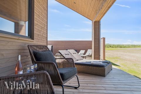 Njut av en grillkväll på terrassen i lyxstuga nr 671 i Fyn och öar