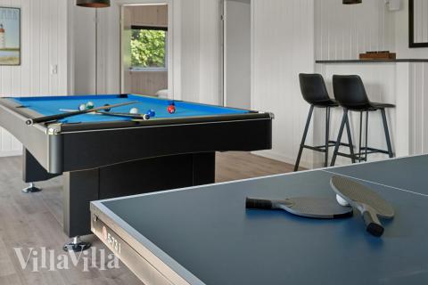 Tävla i sommarhusets aktivitetsrum när ni besöker lyxhus nr 657 i Sydjylland.