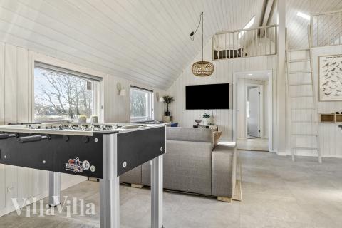 Lyxstuga 182 för 20 personer har ett stort aktivitetsrum med bl.a. biljard och dart