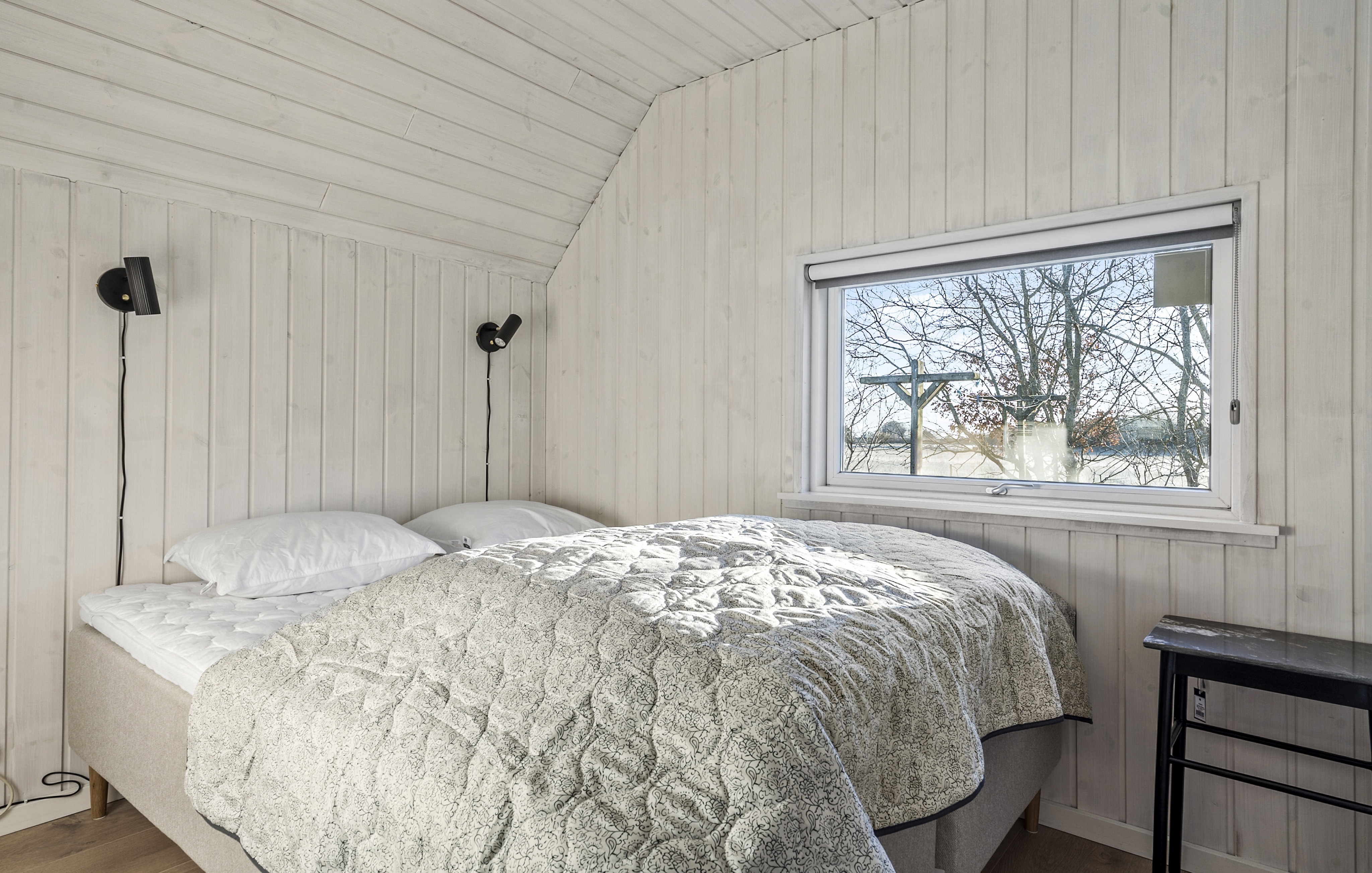 Ett av de 8 utmärkta sovrummen i lyxstuga nr 182 i Sydjylland.