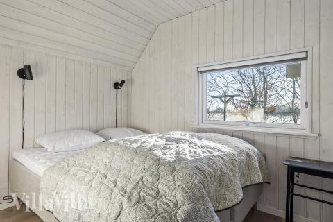 Ett av de 8 utmärkta sovrummen i lyxstuga nr 182 i Sydjylland.