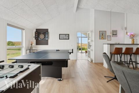 Aktivitetsrum i lyxstuga nr 668 med 6 sovrum och plats för 16 personer.