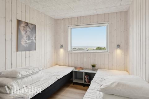 Ett av de 6 utmärkta sovrummen i lyxstuga nr 668 i Fyn och öar.